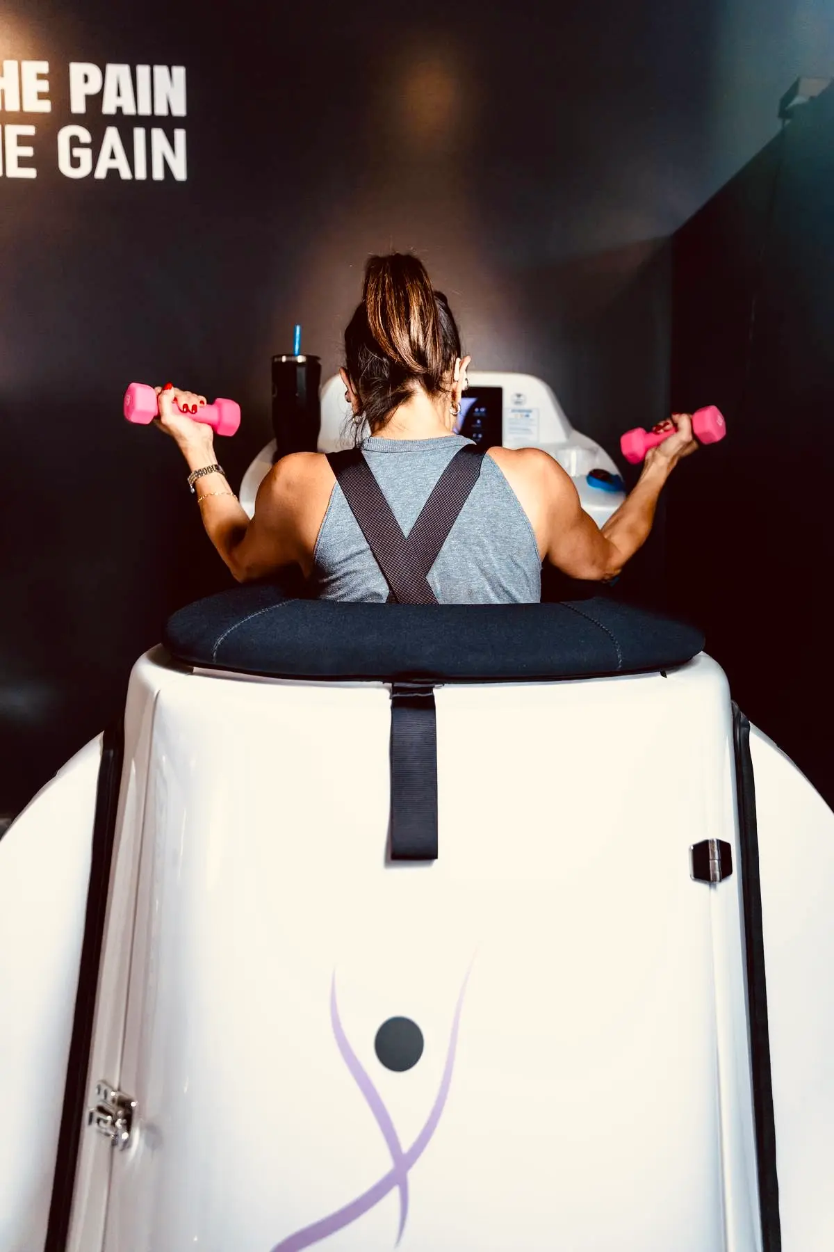 Woman walking on the infrared treadmill at Lux Body Space in Wheaton, IL