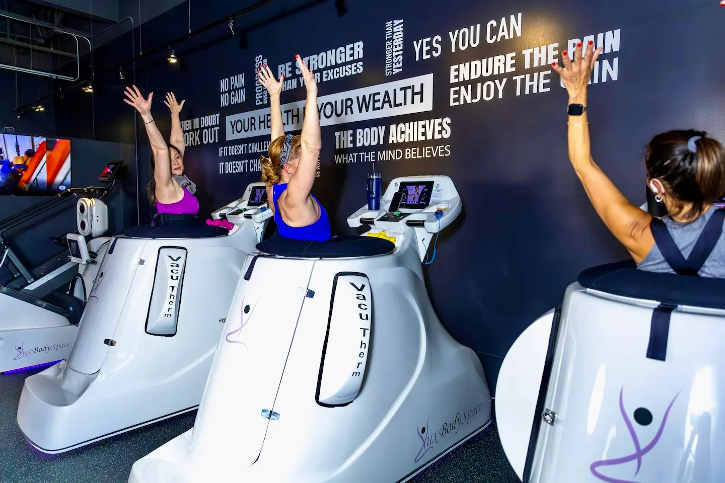 Group of women after a VacuTherm infrared workout at Lux Body Space